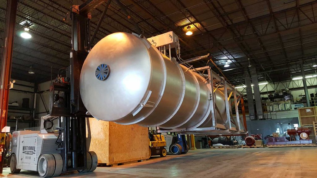 Forklift moving industrial storage tank at National Lift Truck Industrial Storage facility in Chicago