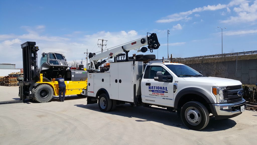 field service tech and crane truck from National Lift Truck in Chicago